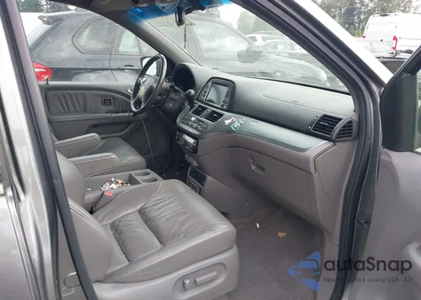 2009 Honda Odyssey Touring z USA, uszkodzony, nr VIN 5FNRL389X9B039650